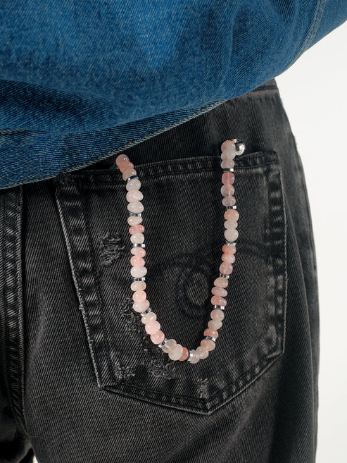 Linked Gemstone Wristlet - High polished rose quartz chips strung together with silver hematite disks.