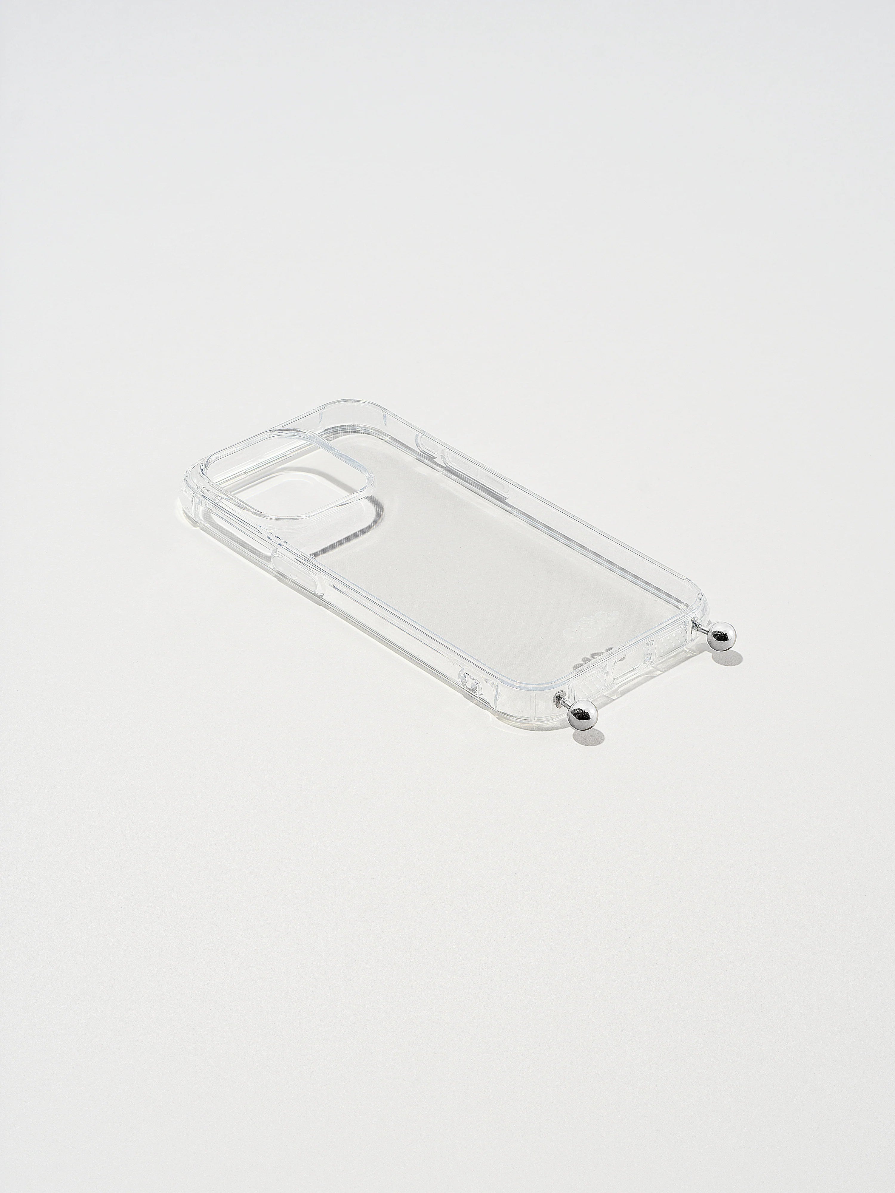 Transparent iphone case with ball stud connection feature.
