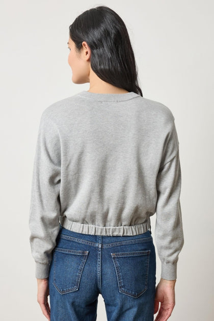 The Elastic Waist Henley Sweater in Cotton Modal yarn.