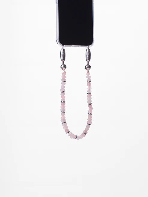 Linked Gemstone Wristlet - High polished rose quartz chips strung together with silver hematite disks.