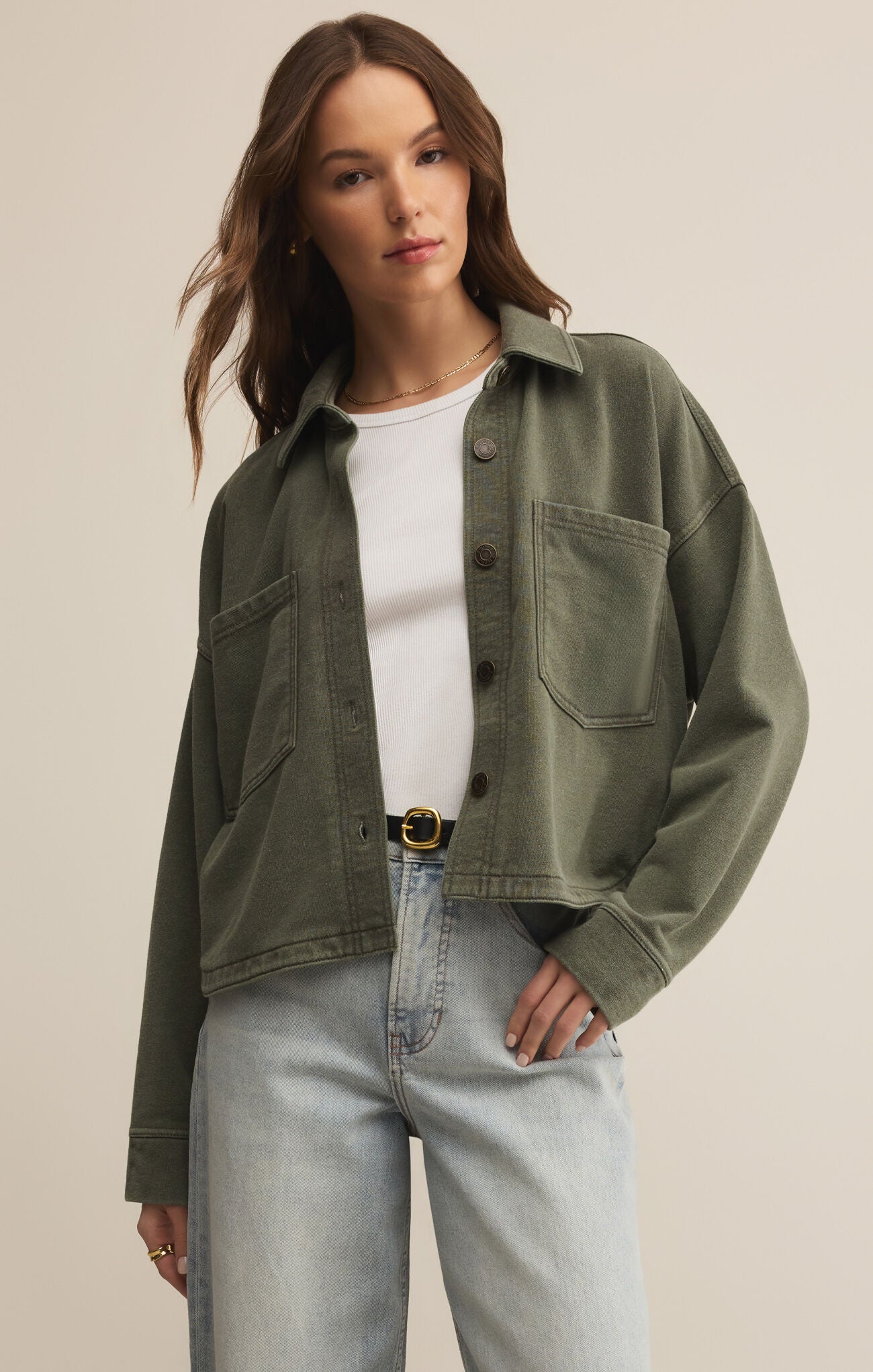The All Day Cropped Knit Jacket in hunter green is your new go-to for playful layering.